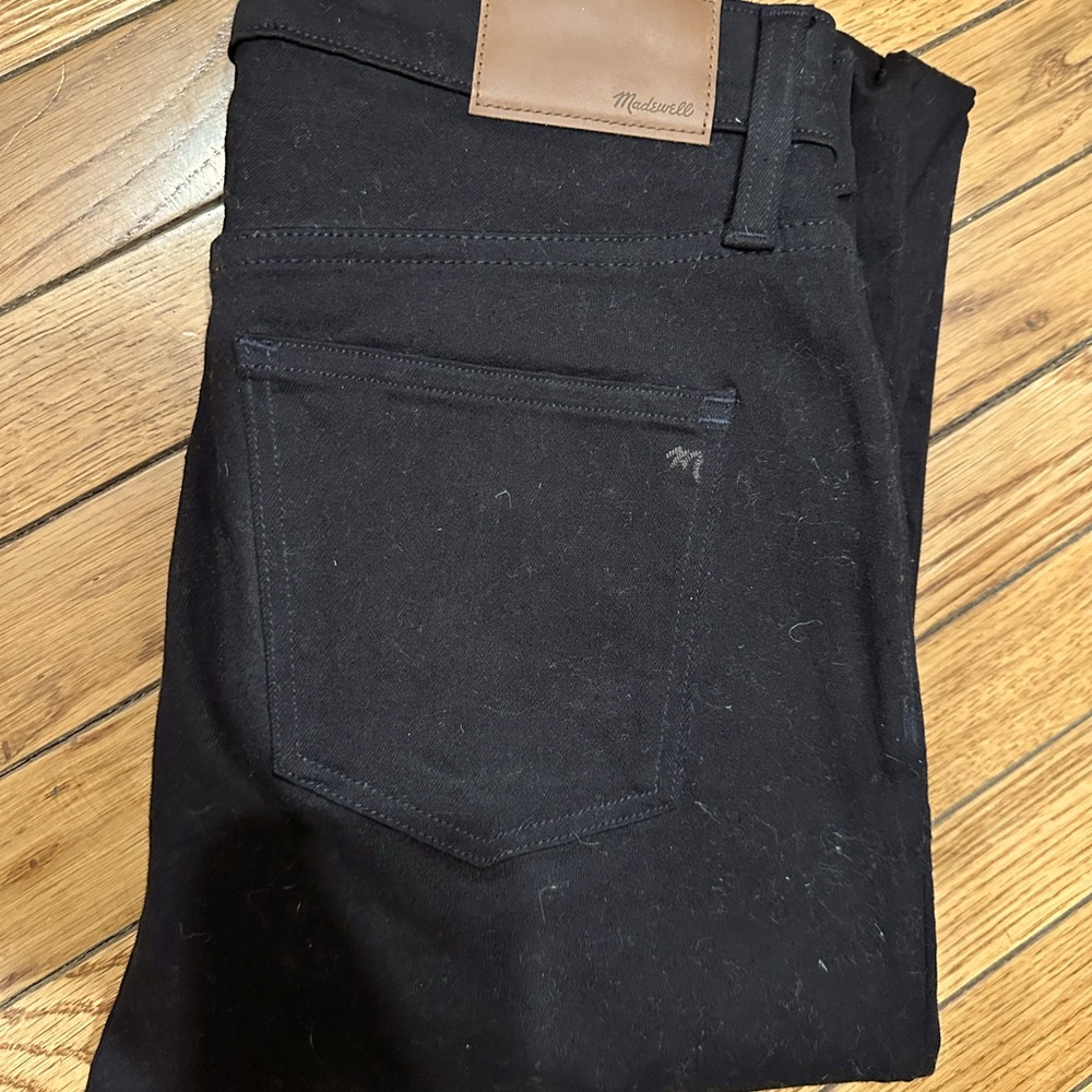 Never worn Madewell black skinny jeans